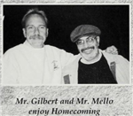 Mr. Gilbert and Mr. Mello enjoy homecoming 